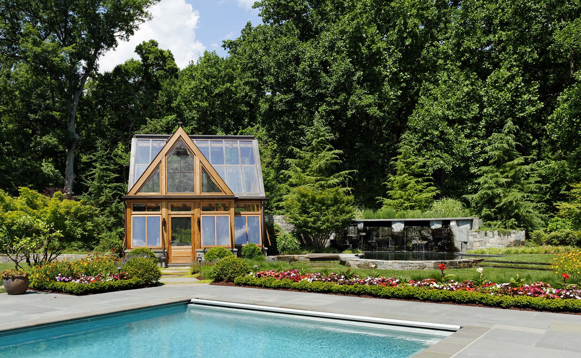 cedar greenhouse | exterior | by pool | beautiful landscape architecture
